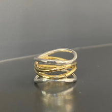 Load image into Gallery viewer, Large ring in wave design in silver and bronze