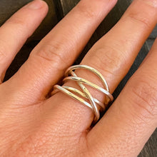 Load image into Gallery viewer, The large silver tangle ring shown worn