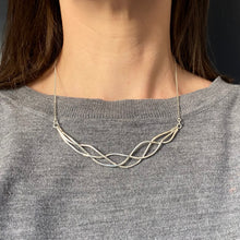 Load image into Gallery viewer, Handmade necklace made out of sterling silver showed worn