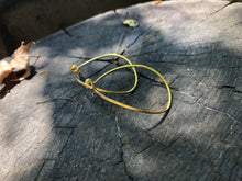 Load image into Gallery viewer, Variable Teardrop hoops in gold plated silver