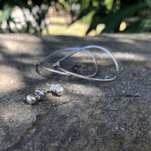 Load image into Gallery viewer, Variable Teardrop hoops in silver