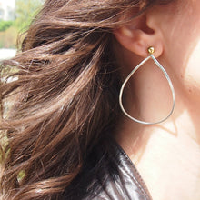 Load image into Gallery viewer, Variable Teardrop hoops in silver and brass