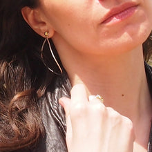 Load image into Gallery viewer, Variable Teardrop hoops in silver and brass