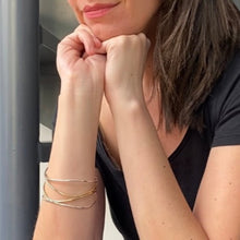 Load image into Gallery viewer, A picture of a women wearing the silver and bronze wave bracelet