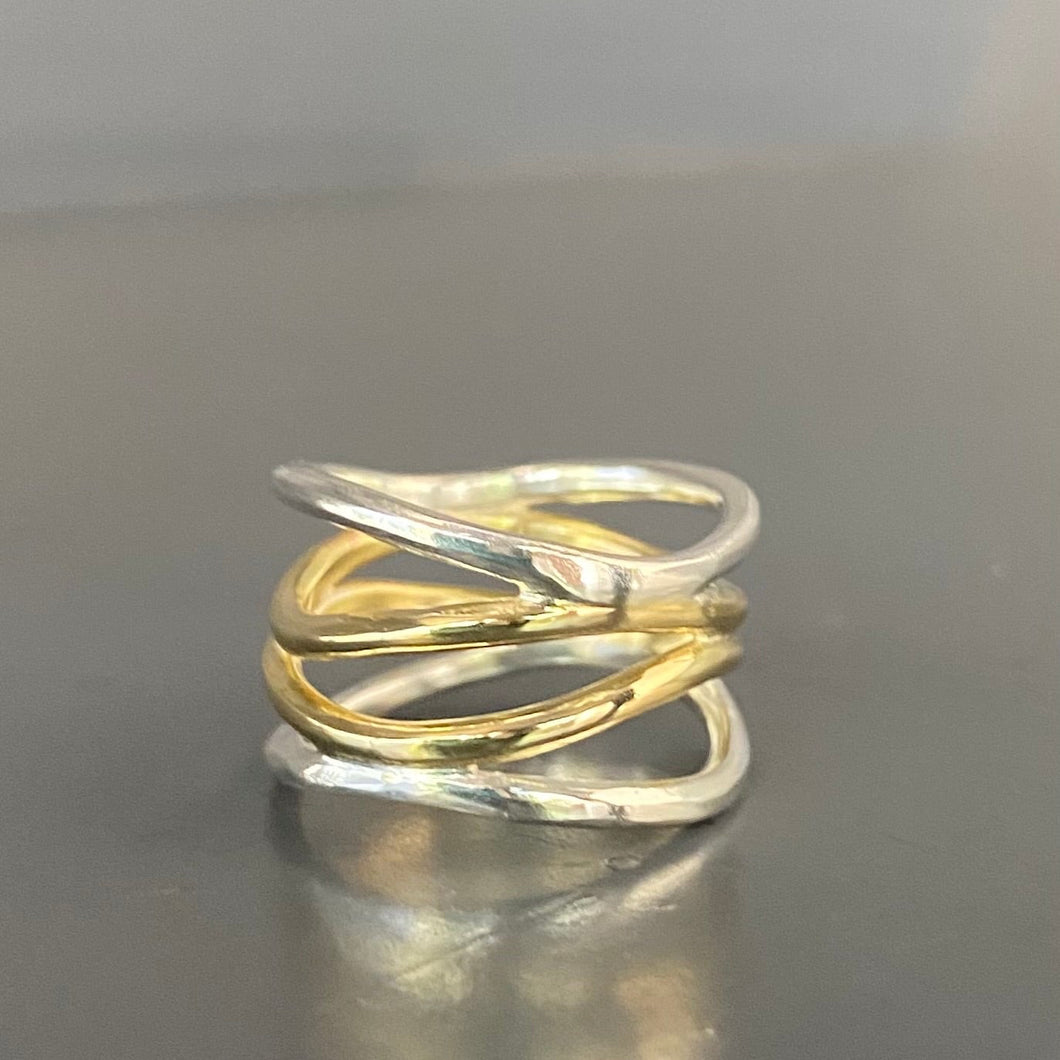 Handmade large ring made out of sterling silver and bronze