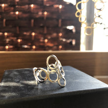 Load image into Gallery viewer, Handmade silver ring band with circles